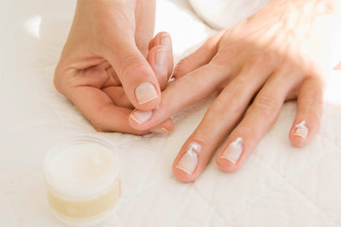 Remove any cream or oil from nails