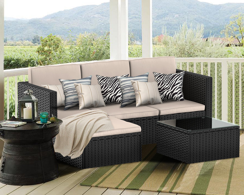 Add Pillows and Blankets to Rattan Garden Furniture