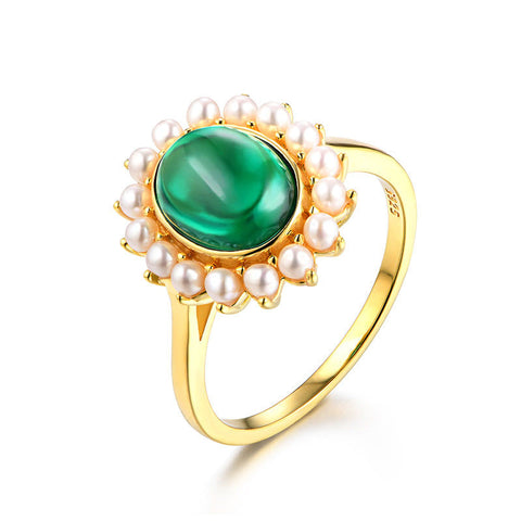 unique emerald ring design for women