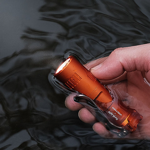 Vosteed EDC Flashlight: An orange Vosteed Reylight flashlight partially submerged in water, highlighting its durability