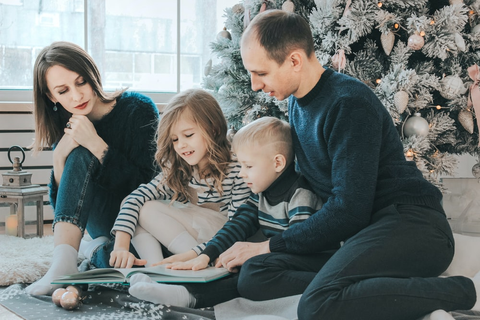 parents and their children are reading books