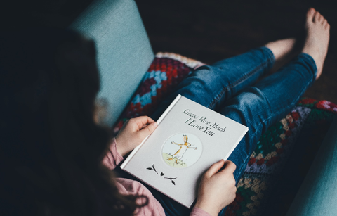 A girl is reading a book