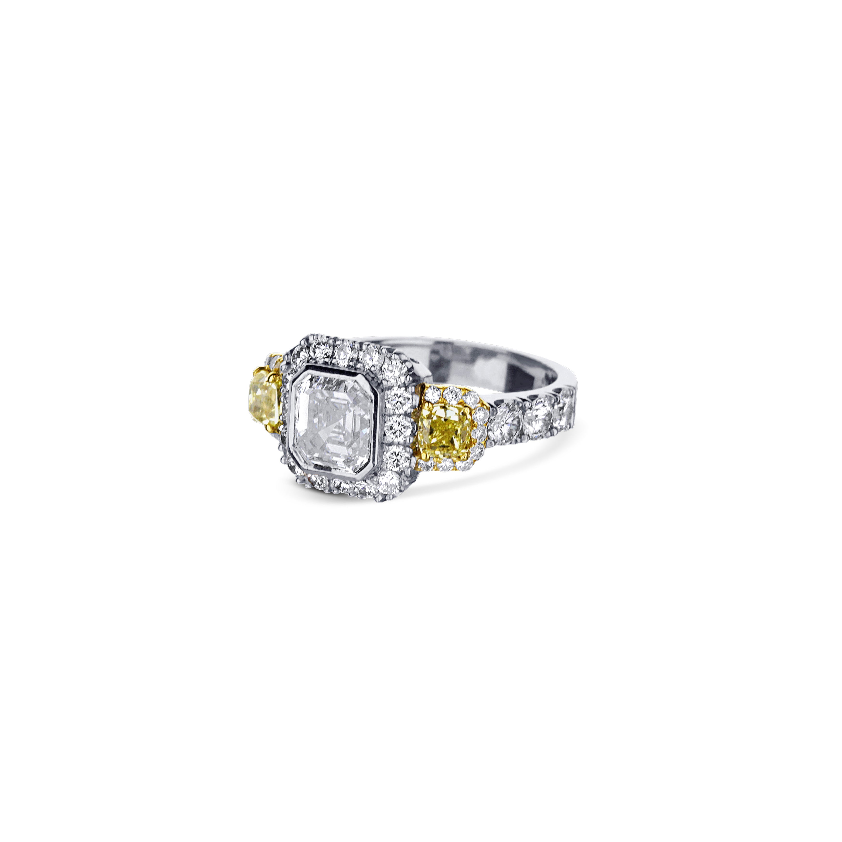 Platinum Emerald Cut Diamond Engagement Ring With Cushion Side Yellow Diamond And Halo