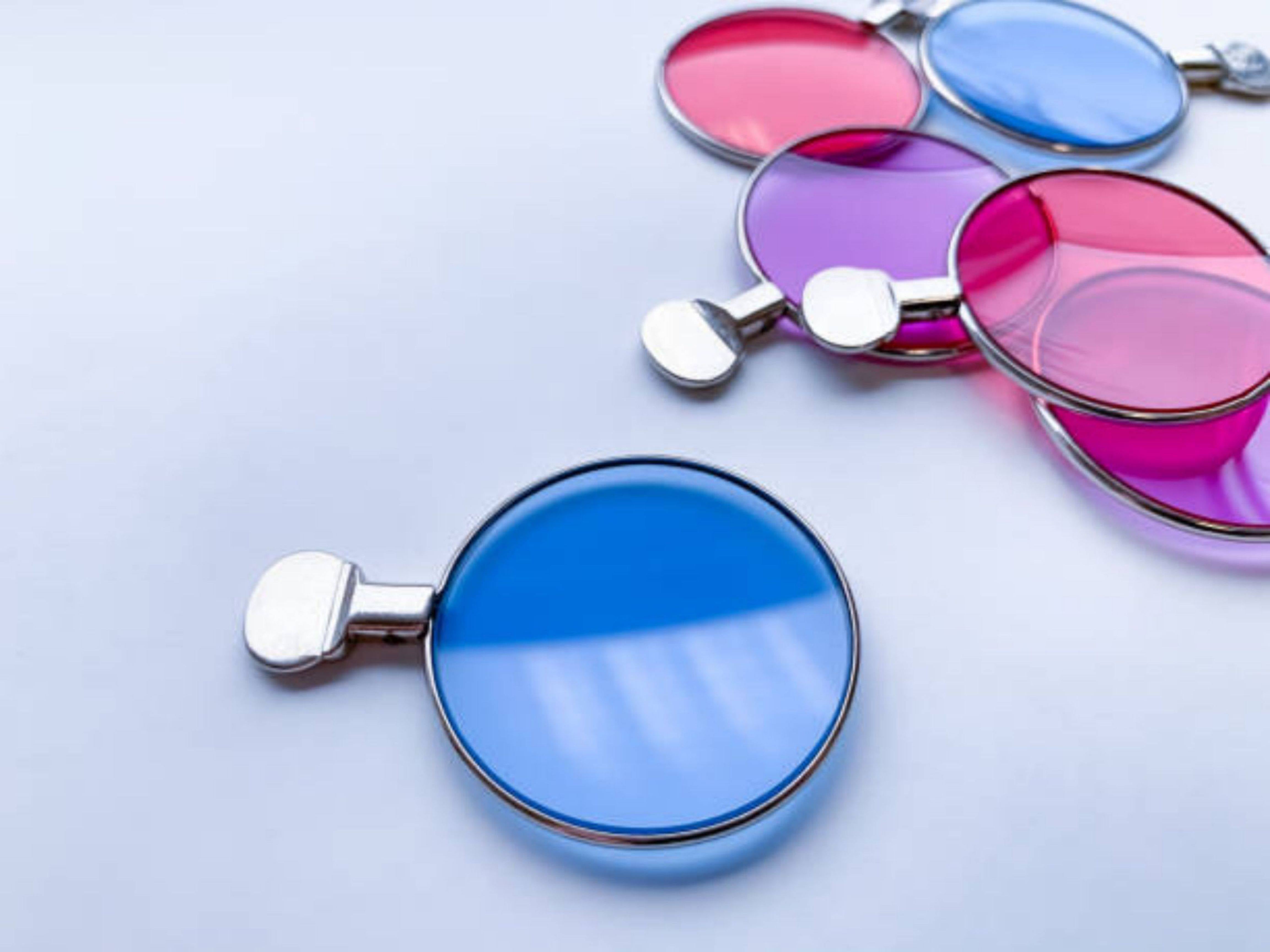 What is the difference between resin lenses and glass lenses