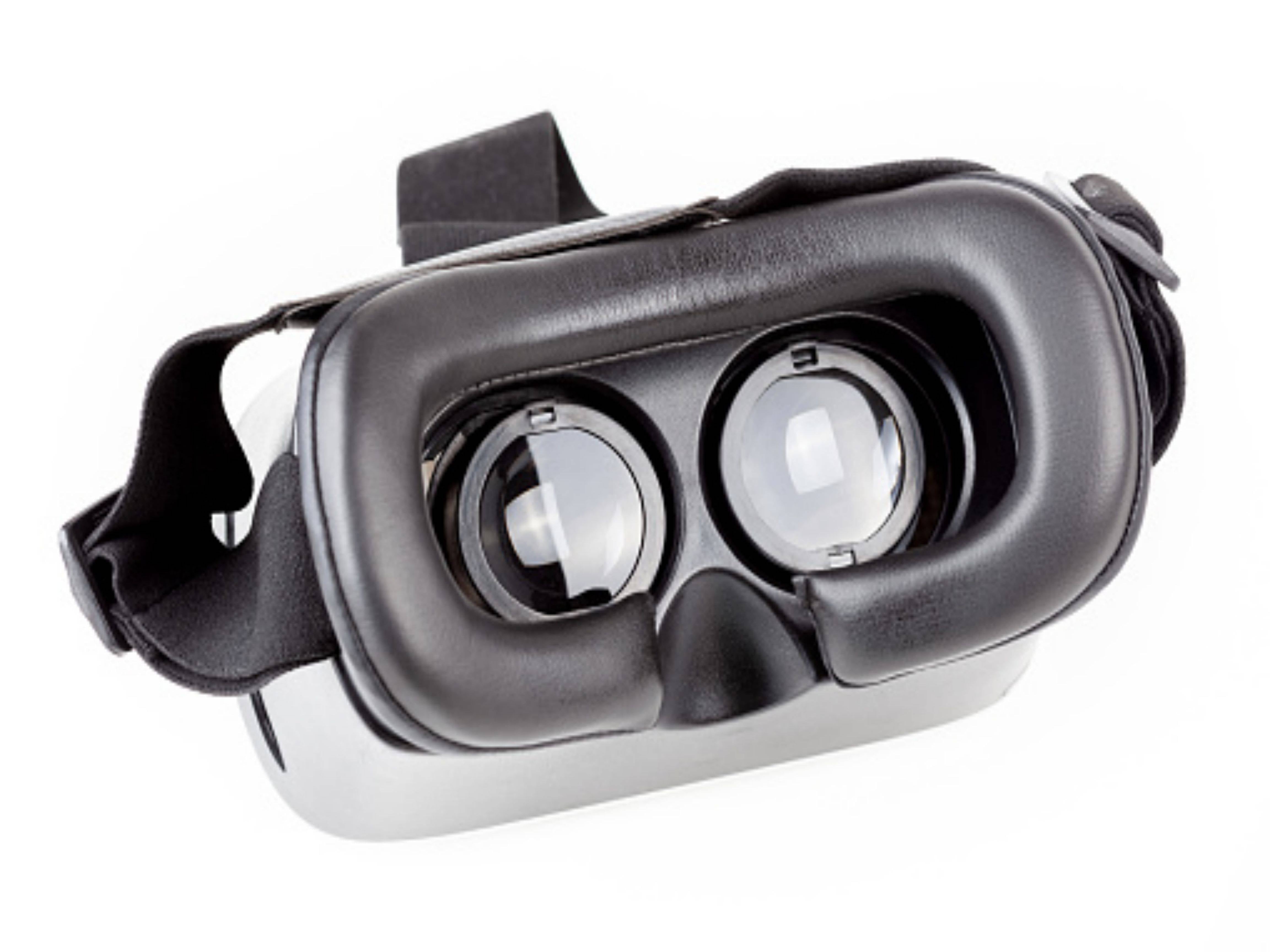 Why is the core technology of VR headsets said to be optical lenses?