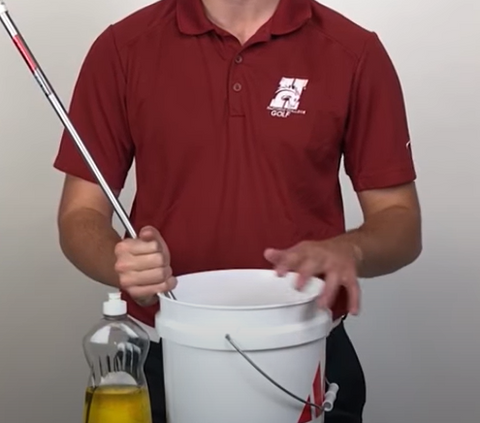 cleaning golf clubs