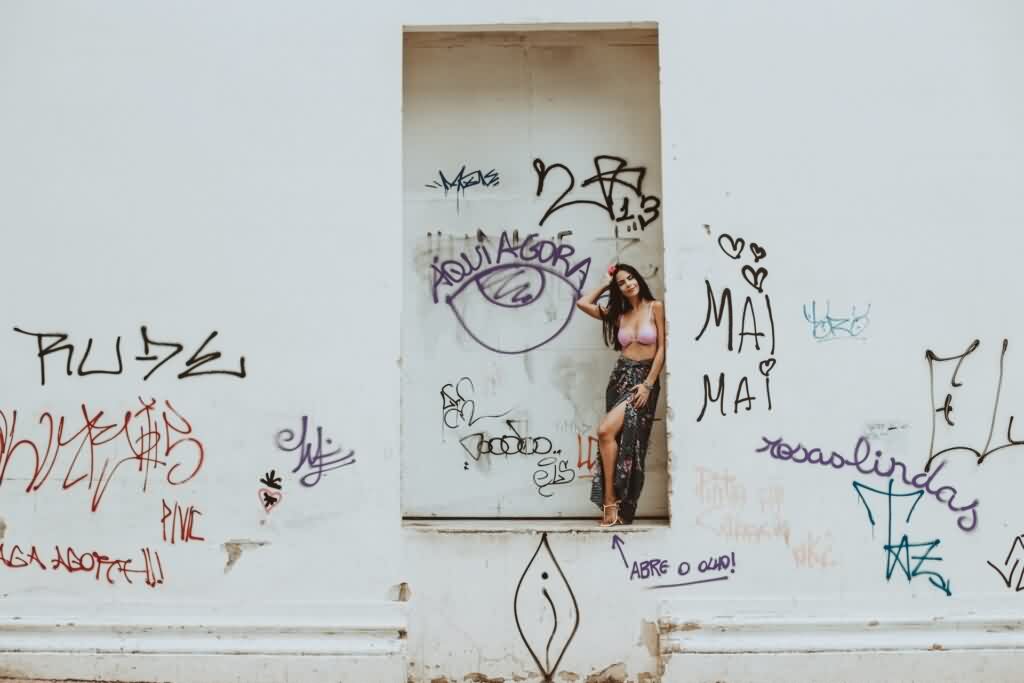 underarms laser hair removal woman leans towards wall