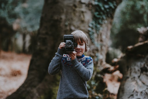 kid with camera