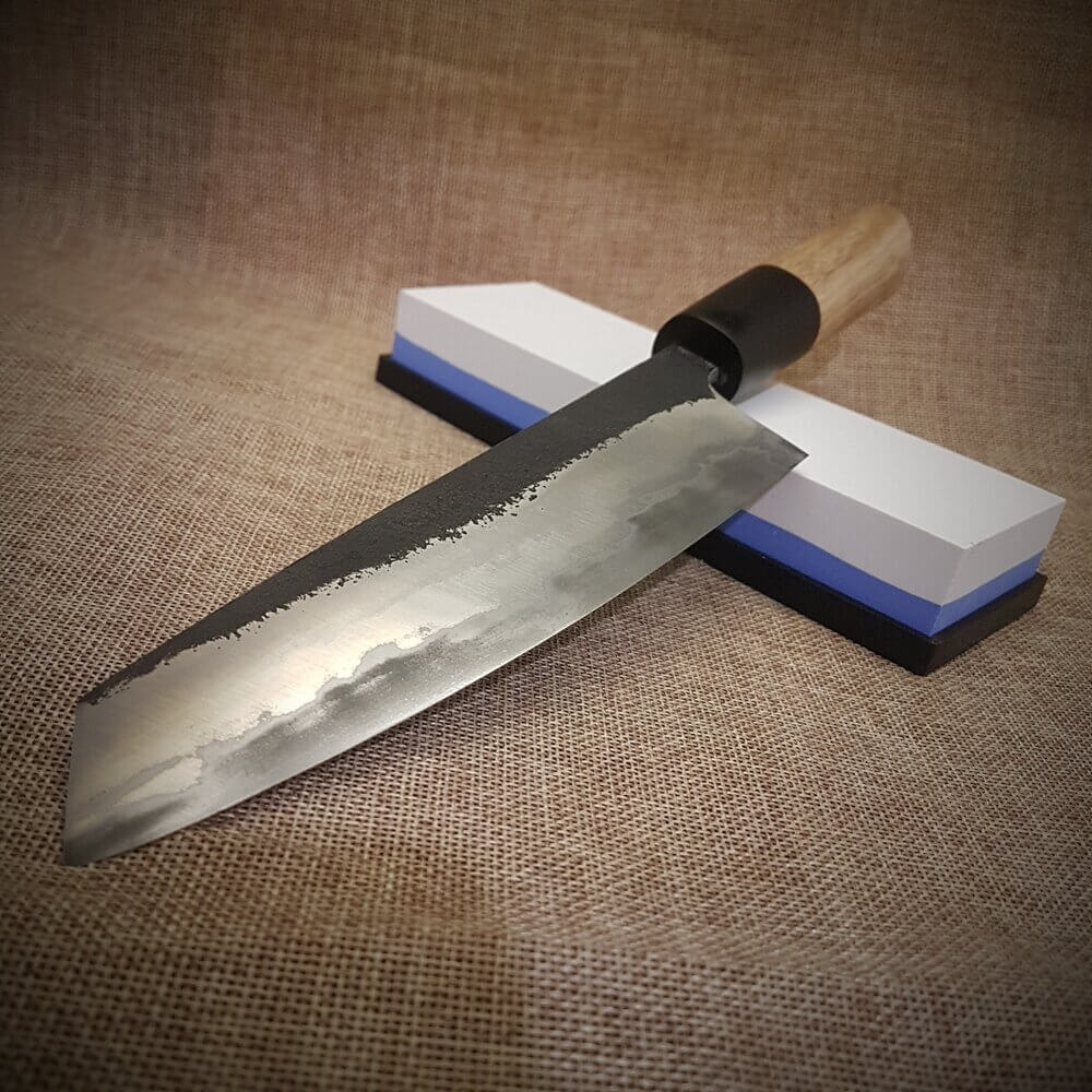 Sharpen carbon steel knives with a whetstone
