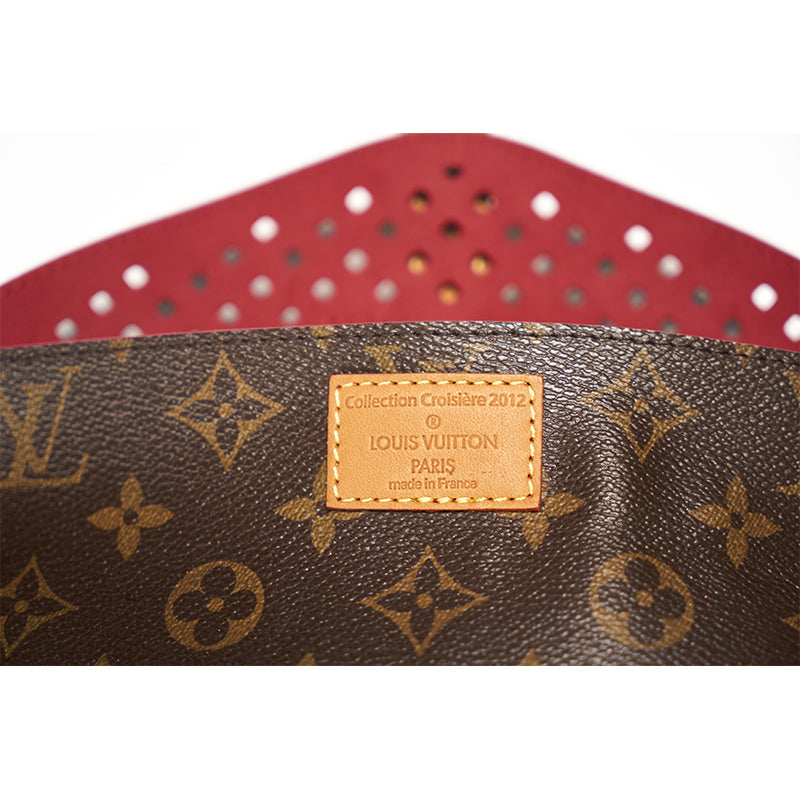 Louis Vuitton Monogram Perfo Saumur Clutch