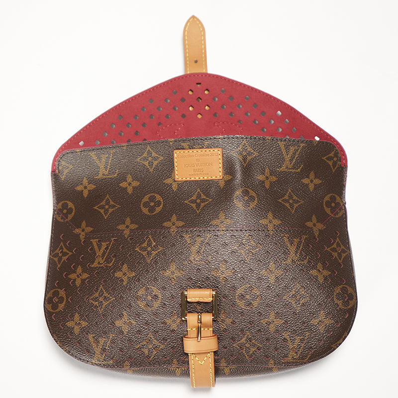 Louis Vuitton Monogram Perfo Saumur Clutch