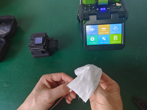 use alcohol to clean the bare fiber