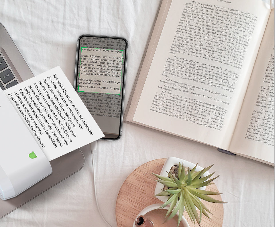 Stylish PeriPage A9 Max portable mini printer as a creative tech gift for students and artists