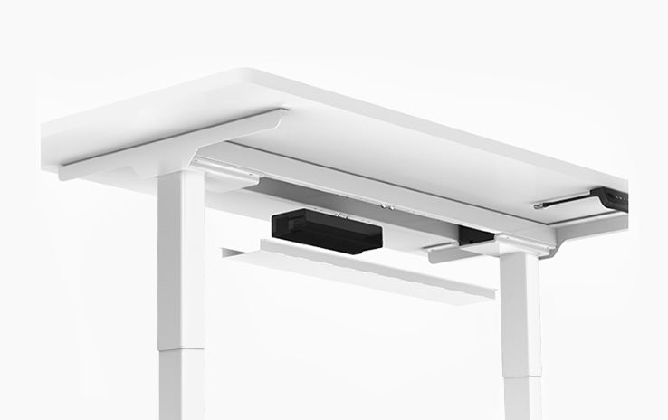 El escritorio de altura ajustable Maidesite S2 Pro viene con un sistema básico de gestión de cables para una parte superior ordenada y organizada
