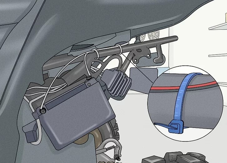 Attachez le câblage au châssis du véhicule avec des attaches à glissière.
