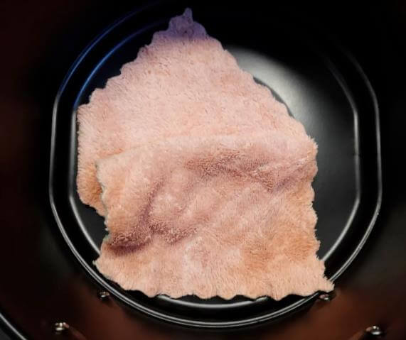 blow dry the cloth in an air fryer