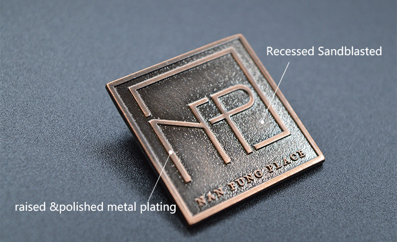 rasied and polised metal badges