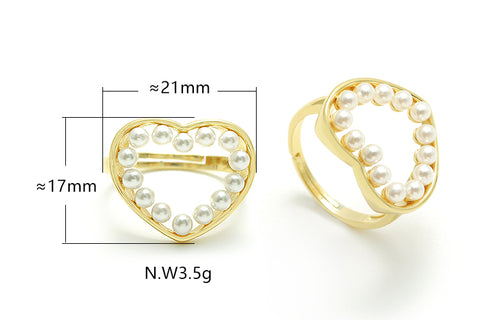 Anel de coração vazado com pérolas no atacado