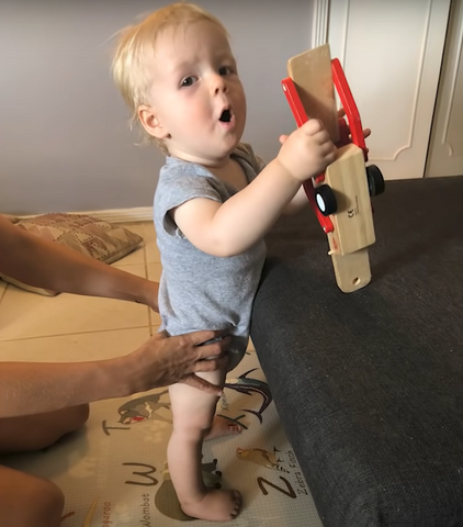 Teach baby to stand hotsell