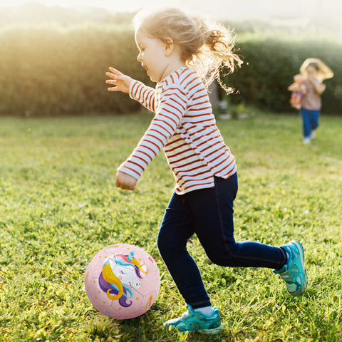 kids kicking soccer balls