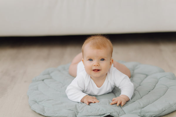 baby  tummy time on play mat