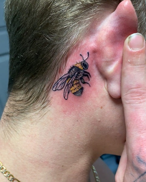 Bee Behind The Ear Tattoo