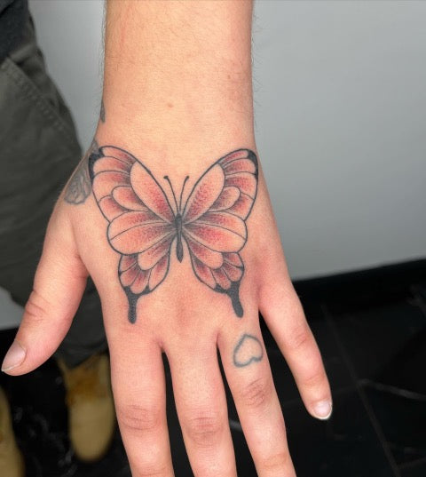 Butterfly Hand Tattoo