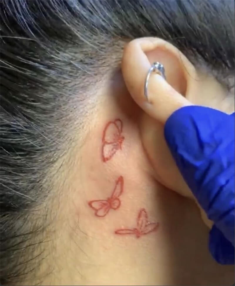 3 butterflies tattoo behind ear