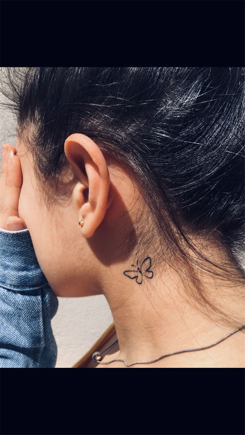 simple butterfly tattoo Behind Ear