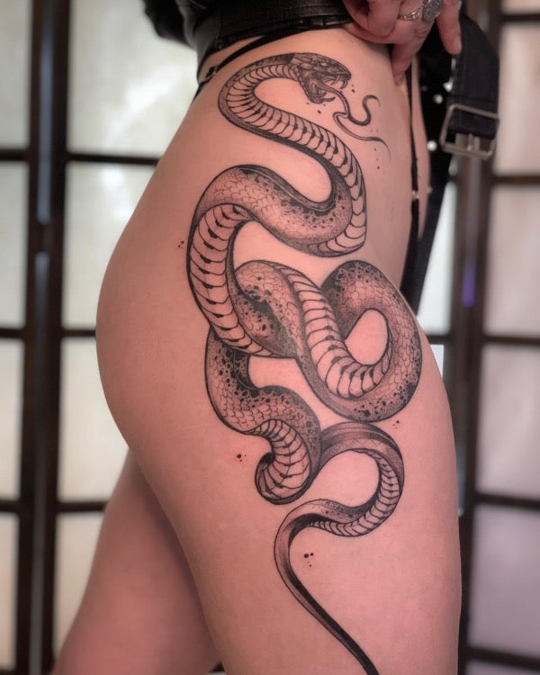 Coiled snake tattoo