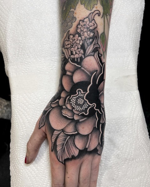 Flower Hand Tattoo