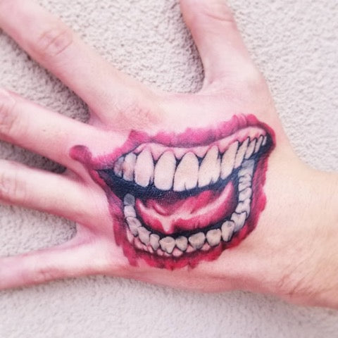 Joker Hand Tattoo