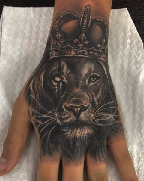 Lion Hand Tattoo