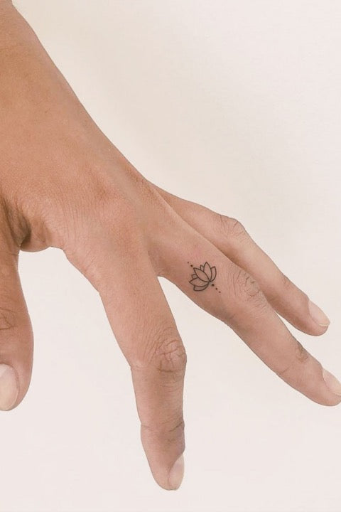 Lotus Finger Tattoo
