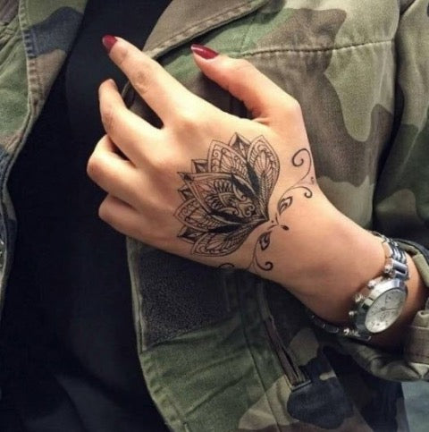 Lotus Hand Tattoo
