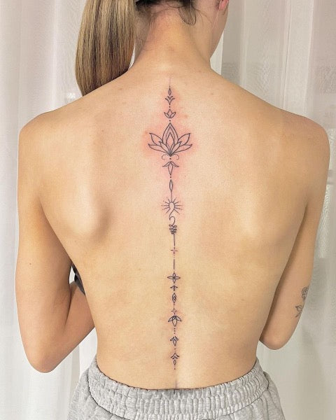 Lotus Spine Tattoo