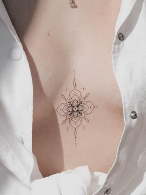 Lotus Sternum Tattoo