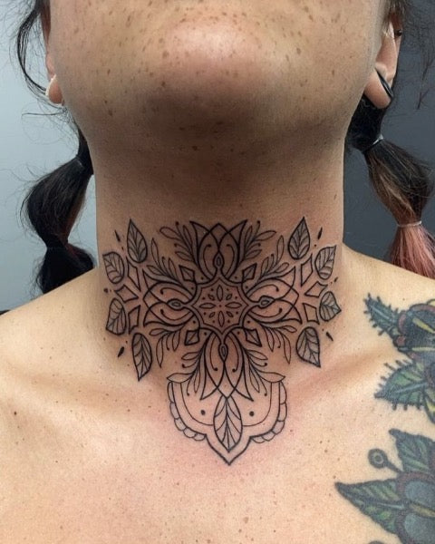 Lotus Throat Tattoo