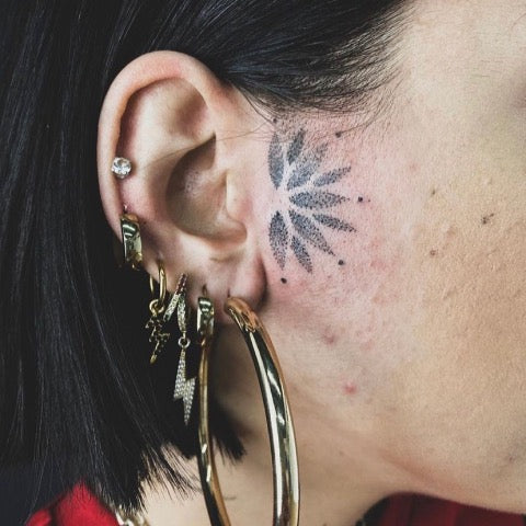 Mandala Face Tattoo
