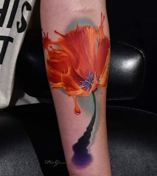 Poppy flower tattoo on the achilles