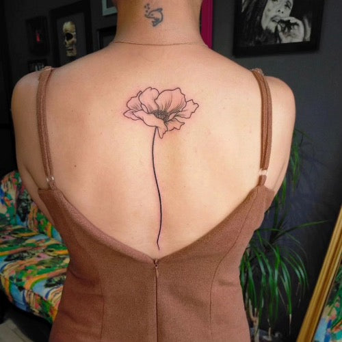 Poppy Flower Spine Tattoo