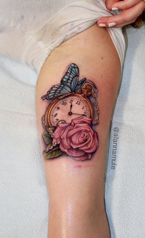 Clock rose and butterfly tattoo
