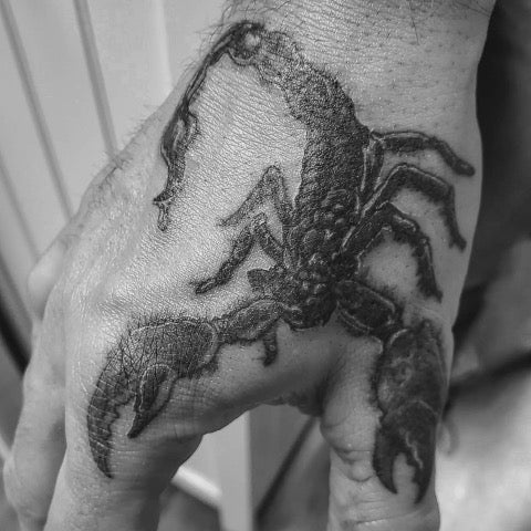 Scorpion Hand Tattoo