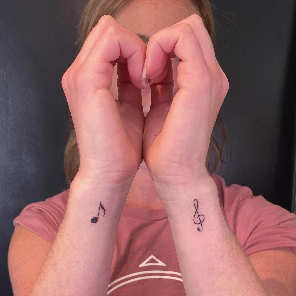 Simple Music Note Tattoo