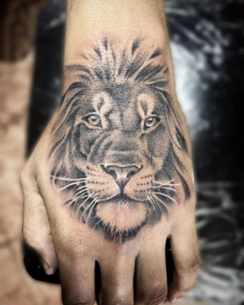 Small Lion Tattoos