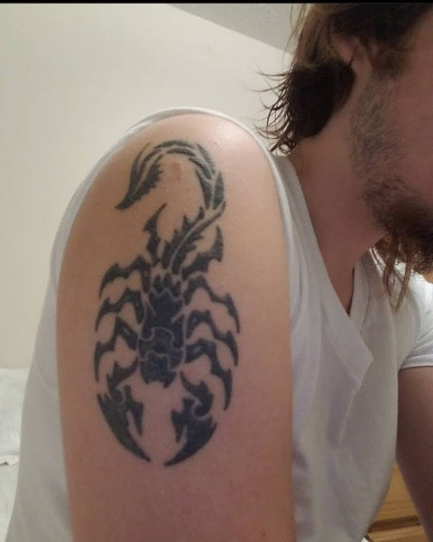 Tribal Scorpion Tattoo