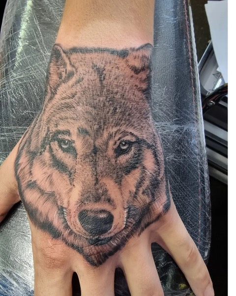 Wolf Hand Tattoo