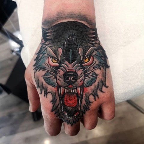 Wolf Hand Tattoo