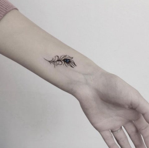 Wrist Feather Tattoo