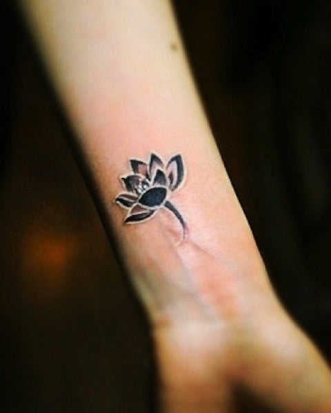 Wrist Lotus Flower Tattoo